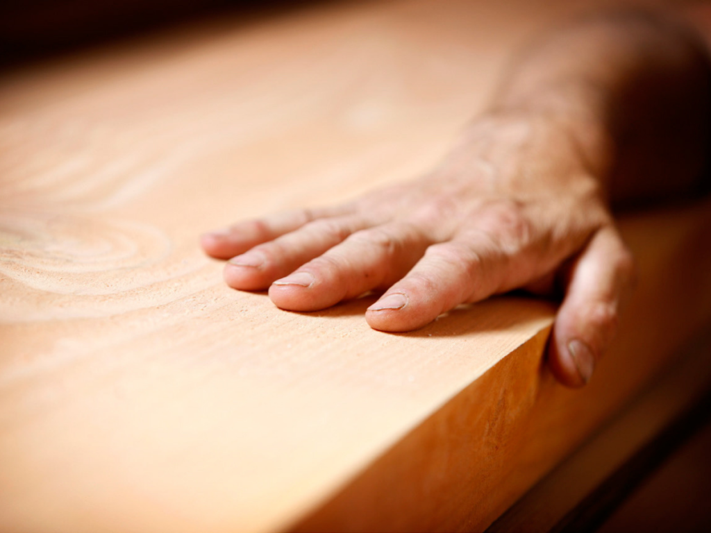 Touching Wooden Surface